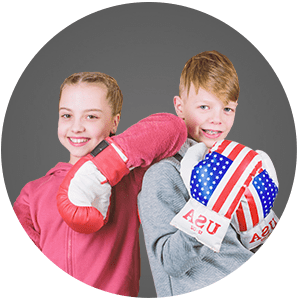 Children posing with boxing gloves